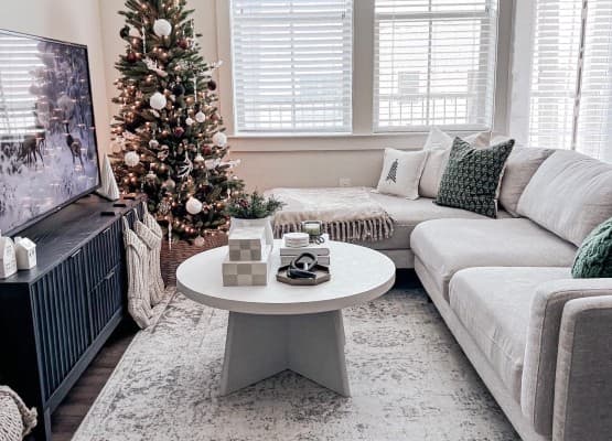 neutral christmas decor sofa